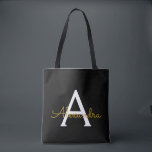 Black Name Gold Girly Script Monogram Modern Tasche<br><div class="desc">Schwarz und Gold Elegant Fügen Sie Ihren eigenen Namen Monogram Book Bag. Diese Büchertasche kann auf Ihren Vor- und Vornamen angepasst werden und als Geschenk für Weihnachten,  Geburtstag,  Brautparty oder Hochzeit.</div>