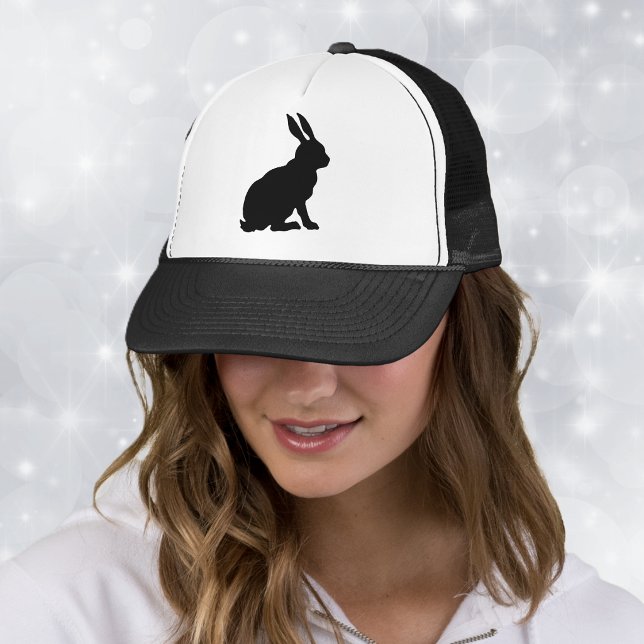 Black Rabbit Silhouette Truckerkappe (Black silhouette of sitting bunny rabbit with big ears on ball cap.)