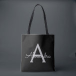 Black Silver Modern Script Girl Monogram Name Tasche<br><div class="desc">Schwarz und Silber Elegant Fügen Sie Ihren eigenen Namen Monogram Book Bag. Diese Büchertasche kann auf Ihren Vor- und Vornamen angepasst werden und als Geschenk für Weihnachten,  Geburtstag,  Brautparty oder Hochzeit.</div>