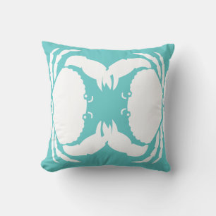 BLANC DE CRABE sur coussin bleu turquoise