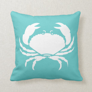 BLANC DE CRABE sur coussin bleu turquoise