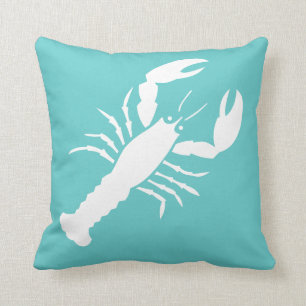 BLANC de HOMARD sur le coussin bleu turquoise