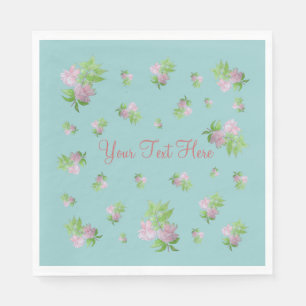 blassblauer Hintergrund mit hübsch rosa Blume Serviette