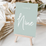 Blasse Grün Hand Skripte Tabelle NINE Tischnummer<br><div class="desc">Einfache und schicke Tischnummer-Karten in Pale Sage Green und Weiß machen eine elegante Aussage bei Ihrer Hochzeit oder Veranstaltung. Das Design bietet "table [number]" in einem spannenden Mix aus klassischen Serifen und handgeschriebenen Skripten. Design wiederholt sich auf beiden Seiten. Einzelne nummerierte Karten werden separat verkauft; bestellen Sie jede Tischnummer einzeln...</div>