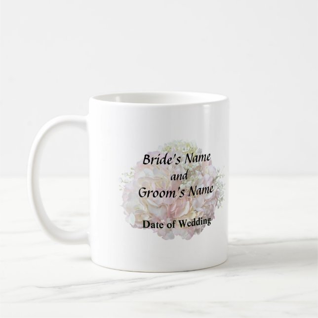 Blassrosa Hydrangea mit Babyatmung Kaffeetasse (Links)
