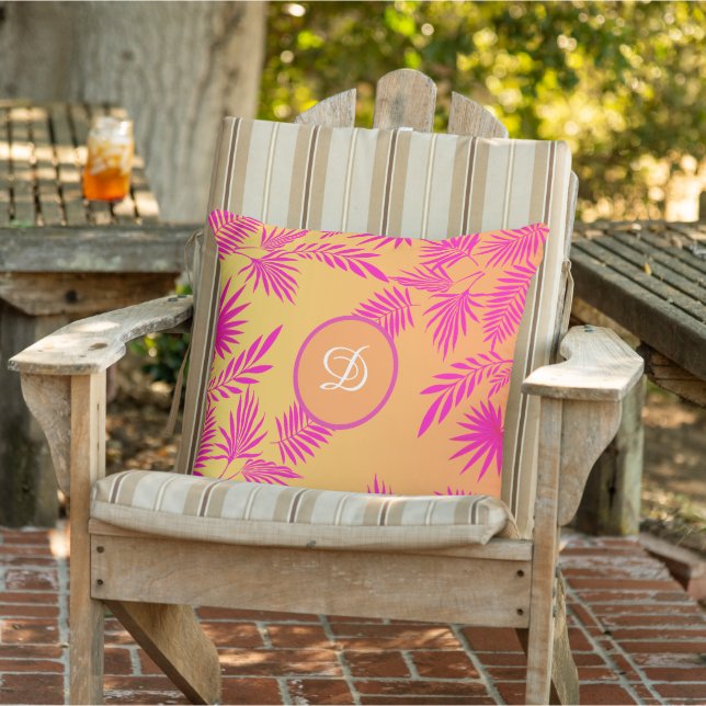 Blätter aus tropischen Palmen, rosa orange Kissen (Stuhl )
