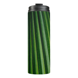 Blätter mit grünen Palmen Thermosbecher