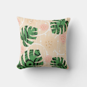 Blätter Monstera auf rosa Kissen