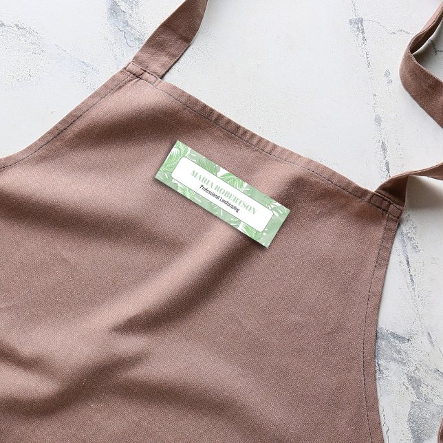 Blätter zum Titel "Beschäftigte" Namensschild (Tropical palm leaves business name tag. )