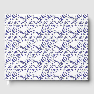 Blau-weiß verpacktes Papier mit grafischer Darstel Gästebuch