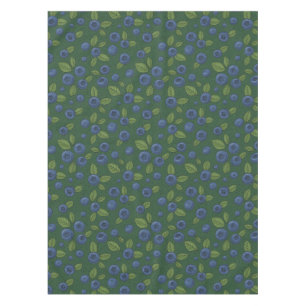 Blaubeeren auf dunkelgrün tischdecke