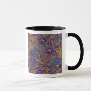 Blaue Blumen gegen Blatttarnungsmuster Tasse