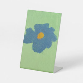 Blaue Blumenmalerei Sockelschild