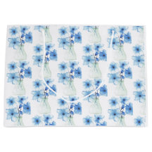 Blaue Blüten in Glasvase