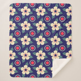 Blaue Decke mit Creme-Blume Sherpadecke