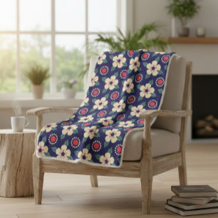 Blaue Decke mit Creme-Blume Sherpadecke
