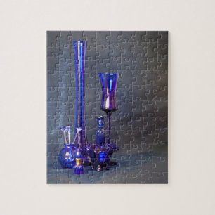 Blaue Glas-Vasen-Puzzle vertikal