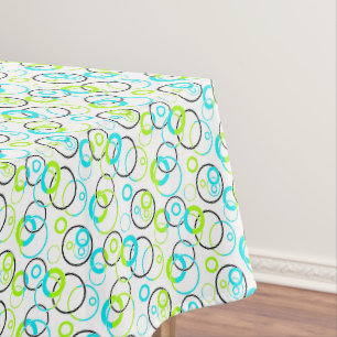 blaue grüne und schwarze Ringe und Kreise auf Weiß Tischdecke