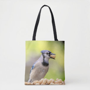 Blaue Jay mit Erdnuss Tasche