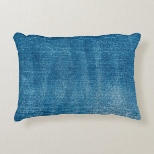 Blaue Jeans nahe sich. Blauer Denim Jean Dekokissen