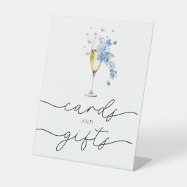 Blaue Perlen und Prosecco Karten und Geschenke Sockelschild