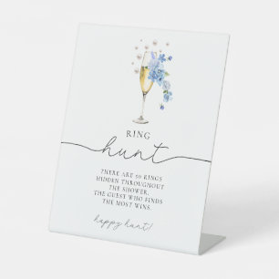 Blaue Perlen und Prosecco Ristorante della Carrà Sockelschild
