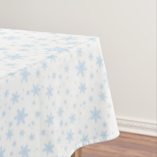 Blaue Schneeflocken auf Weiß Tischdecke