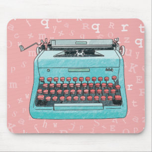 Blaue Schreibmaschine auf rosa Mousepad