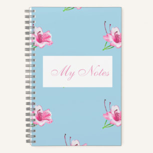 Blaue Tasse mit rosa Lilien Notizbuch