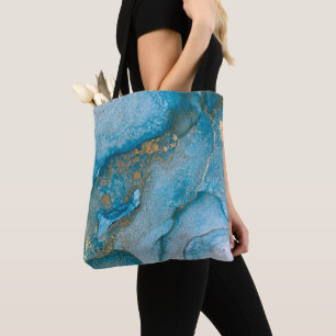 Blaue und goldene abstrakte Flüssigkeitskunst mit Tasche
