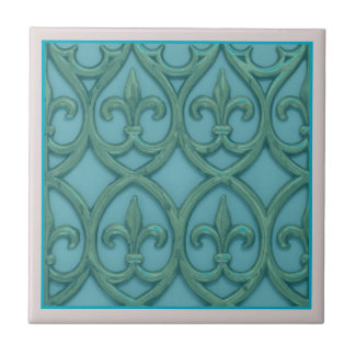 Blaue und grüne Fleur-de-lis Fliese