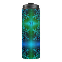 Blaue und grüne Schneeflocken-Monogramm-Thermaltum