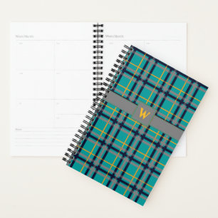 Blaue und orange karierte Planerin Planer