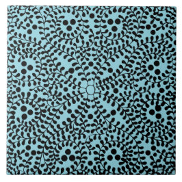 Blaue und schwarze geometrisch gemusterte Keramikf Fliese