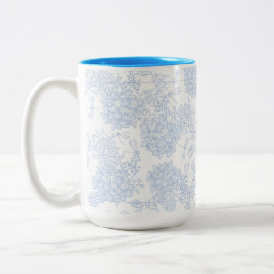 Blaue und weiße elegante Blumenmuster Zweifarbige Tasse