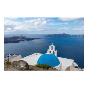 Blaue und weiße Kirche am Meer Fotodruck