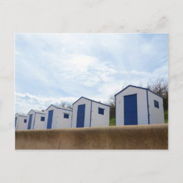 Blaue und weiße Strandhütten Postkarte
