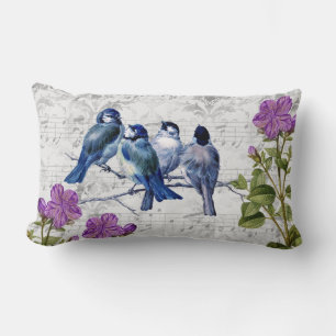 Blaue Vögel und lila Blumen auf grauer Notenblätte Lendenkissen