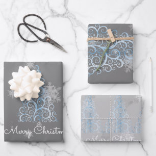 Blaue Weihnachtsbaume und Schneeflocken Geschenkpapier Set