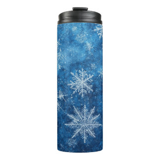 Blaue Weihnachtsschneeflocke Thermosbecher