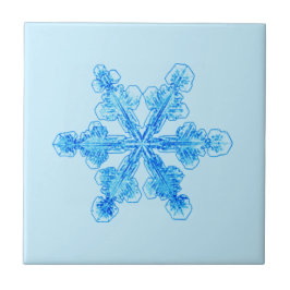 Blaue Winterschneeflocke Fliese