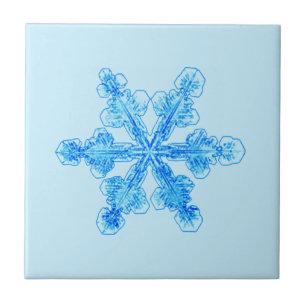 Blaue Winterschneeflocke Fliese
