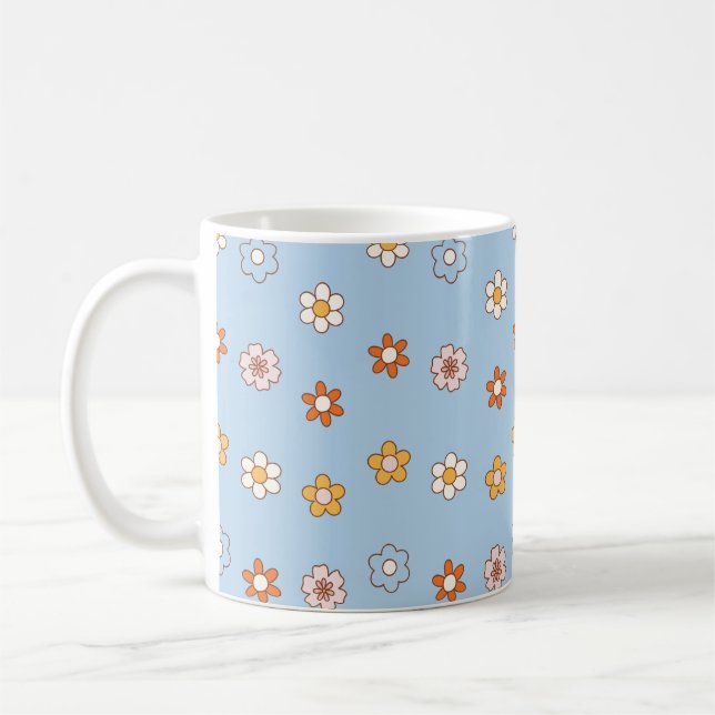 Blauer Hintergrund mit Blumen in gemischten Farben Kaffeetasse (Links)