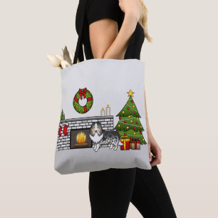 Blauer Merle Shetland Sheepdog in einem Weihnachts Tasche