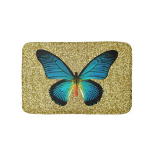 Blauer Schmetterling auf Gold Glitzer Badematte