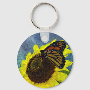 Blauer Schmetterling und Sonnenblume Hintergrund Schlüsselanhänger