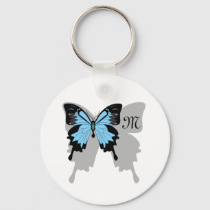Blauer Schmetterlingsschattenmonogramm Schlüsselanhänger