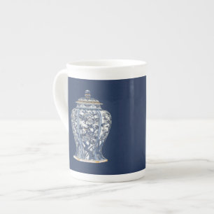Blauer u. weißer Porzellan-Vase durch Prozellantasse
