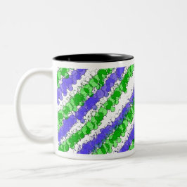 Blauer und grüner Spritzer erschüttert Zweifarbige Tasse