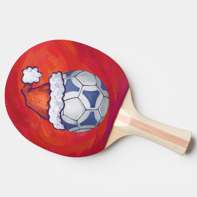 Blauer und weißer festlicher Fußball auf Rot Tischtennis Schläger (Seitenansicht)
